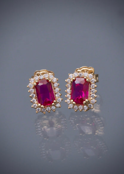 Topos con swarovski fucsia y blanco 2.15gr / Largo 0.9cm / Oro Amarillo Nac M