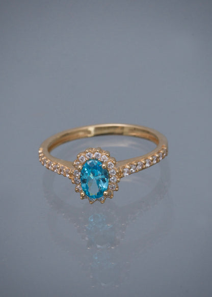 Solitario ovalado con swarovski azul y blanco 2.1gr / Talla 7 1/4 / Oro Amarillo Nac M