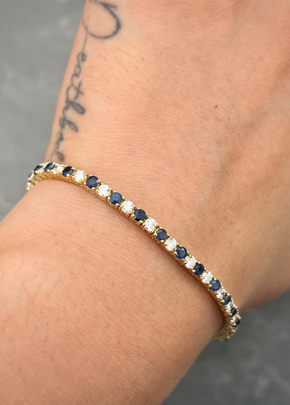 Pulso Tenis con 283pts de Zafiros y 204pts de Diamantes 9.85gr / 17.5cm / 2.6mm — Oro Amarillo