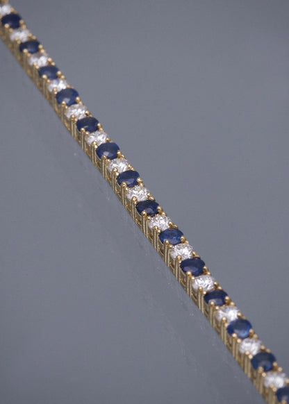 Pulso Tenis con 283pts de Zafiros y 204pts de Diamantes 9.85gr / 17.5cm / 2.6mm — Oro Amarillo