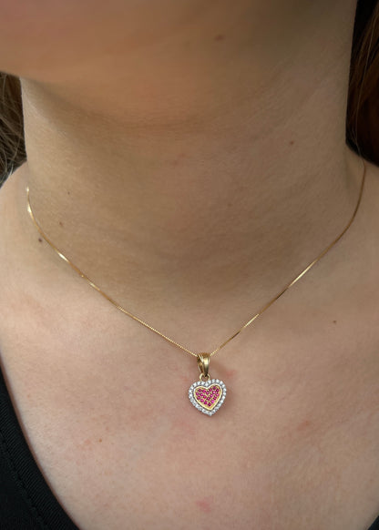 Dije corazon con swarovski fucsia y blanco 1.4gr / Largo 1.7cm / Oro Amarillo Nac M