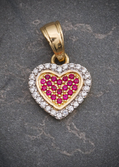 Dije corazon con swarovski fucsia y blanco 1.4gr / Largo 1.7cm / Oro Amarillo Nac M