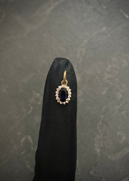 Dije ovalado con swarovski azul y blanco 0.6gr / Largo 1.4cm / Oro Amarillo Nac M