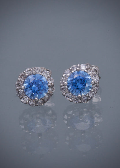 Topos flor con swarovski azul y blanco 3.1gr / Largo 0.9cm / Oro Blanco Nac P