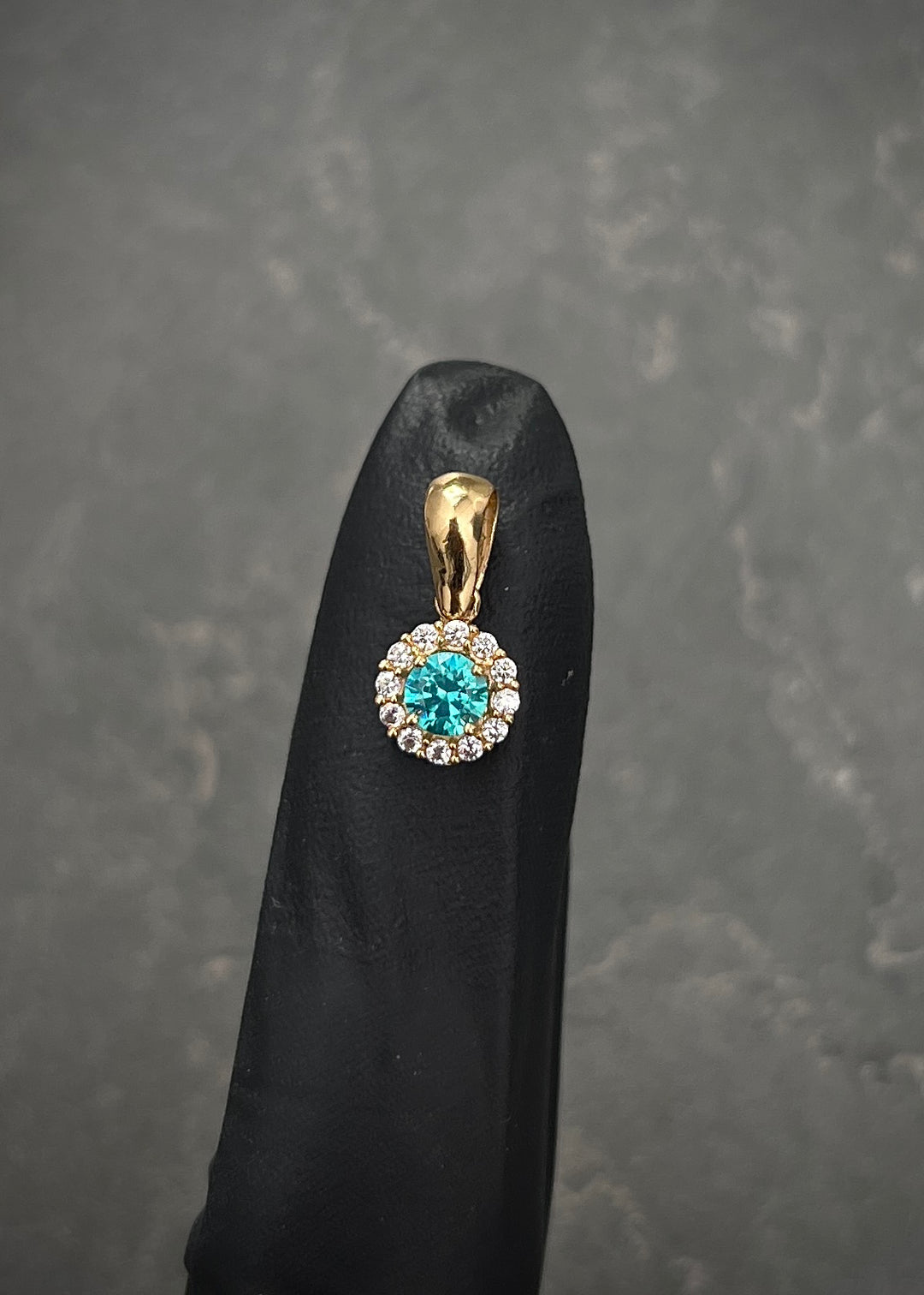 Dije flor con swarovski blanco y azul 0.9gr / Largo 1.4cm — Oro Amarillo