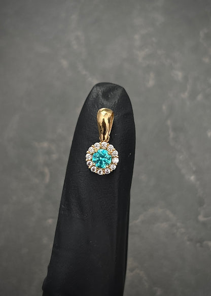 Dije flor con swarovski blanco y azul 0.9gr / Largo 1.4cm / Oro Amarillo Nac P