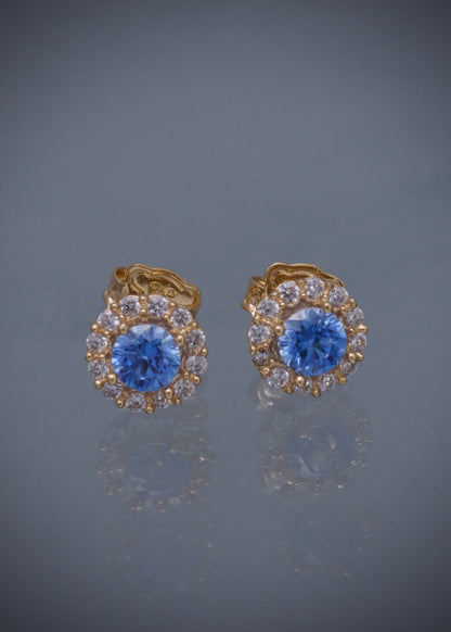 Topos flor con swarovski azul y blanco 2.2gr / Largo 0.7cm / Oro Amarillo Nac P