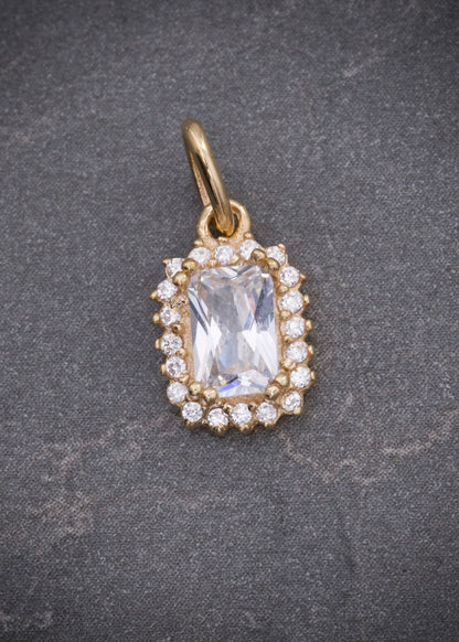 Dije con swarovski blanco 0.95gr / Largo 1.5cm / Oro Amarillo Nac P