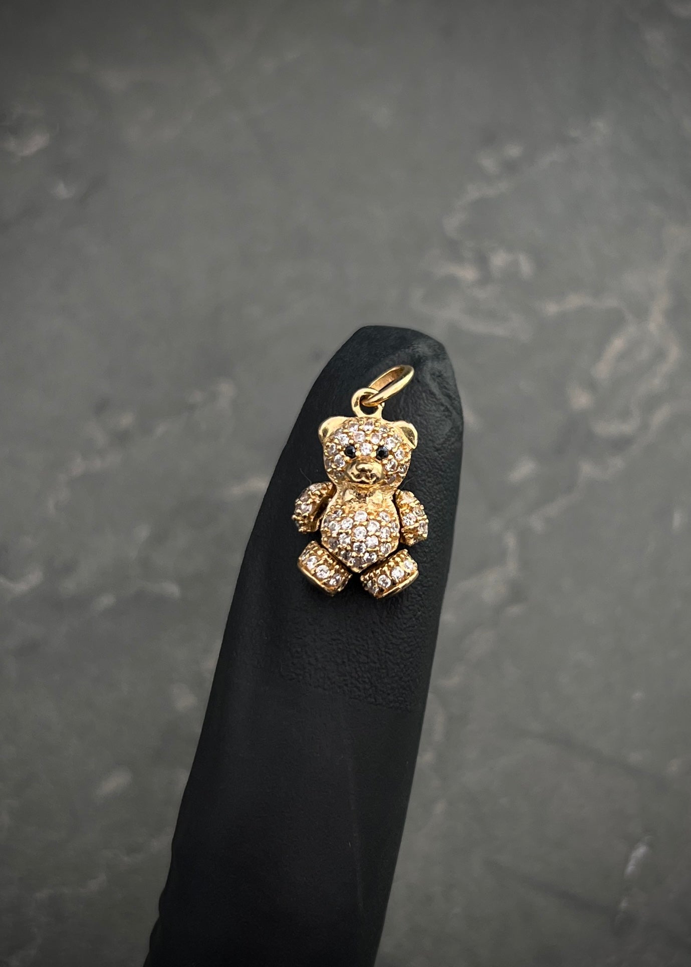 Dije oso articulado con swarovski blanco 2.6gr / Largo 2cm / Oro Amarillo Nac M