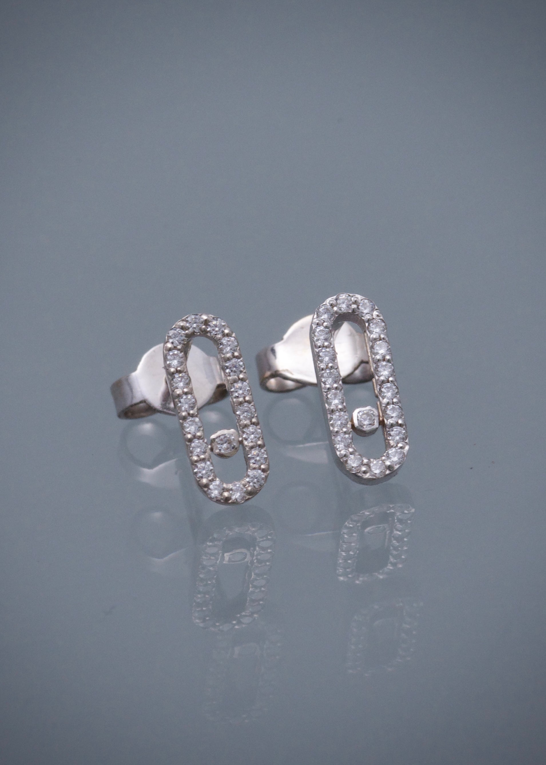 Topos MK con swarovski blanco 1.35gr / Largo 1cm / Oro Blanco Nac M