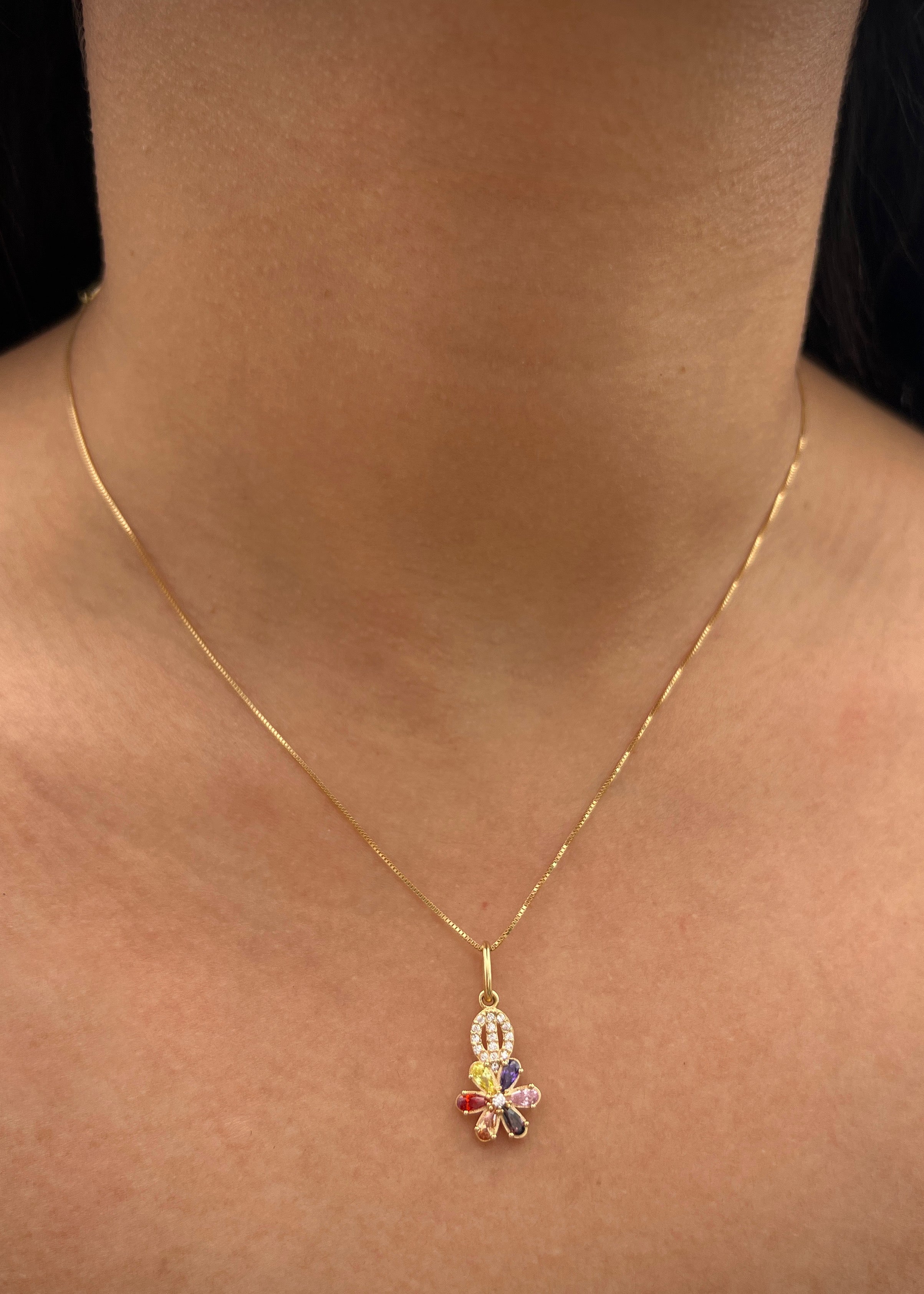 Dije flor con swarovski multicolor 1.4gr / Largo 2.3cm / Oro Amarillo Nac P