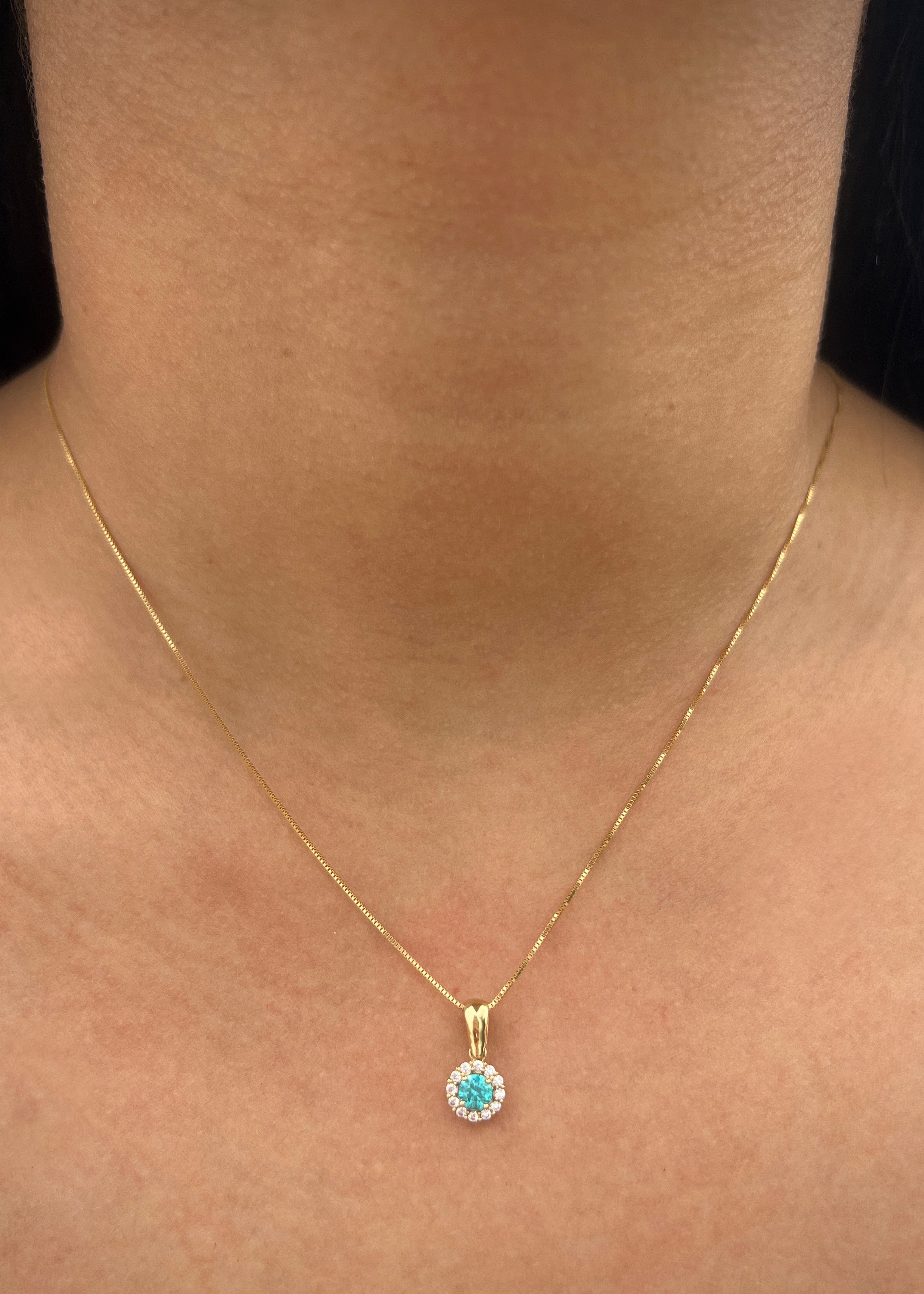 Dije flor con swarovski blanco y azul 0.9gr / Largo 1.4cm / Oro Amarillo Nac P