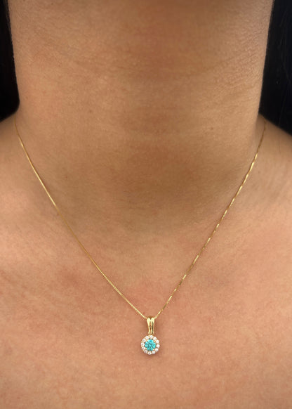 Dije flor con swarovski blanco y azul 0.9gr / Largo 1.4cm / Oro Amarillo Nac P