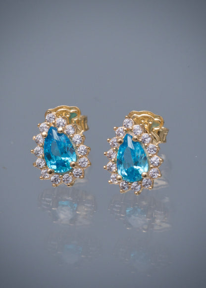 Topos gota con swarovski azul y blanco 1.8gr / Largo 1cm / Oro Amarillo Nac P