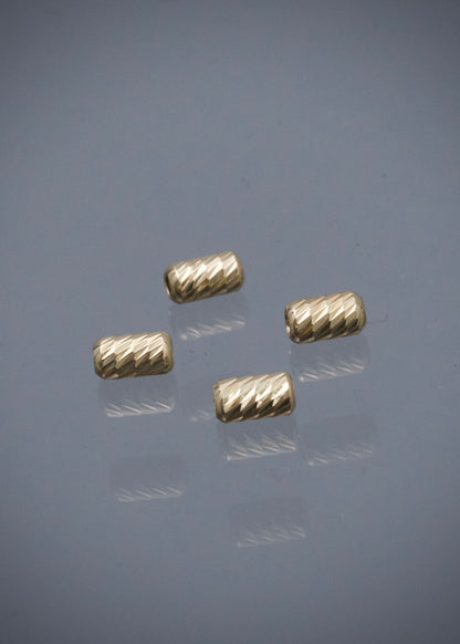 Herraje Tubo Diamantado 0.1gr / Largo 0.5cm / Oro Amarillo Nac B