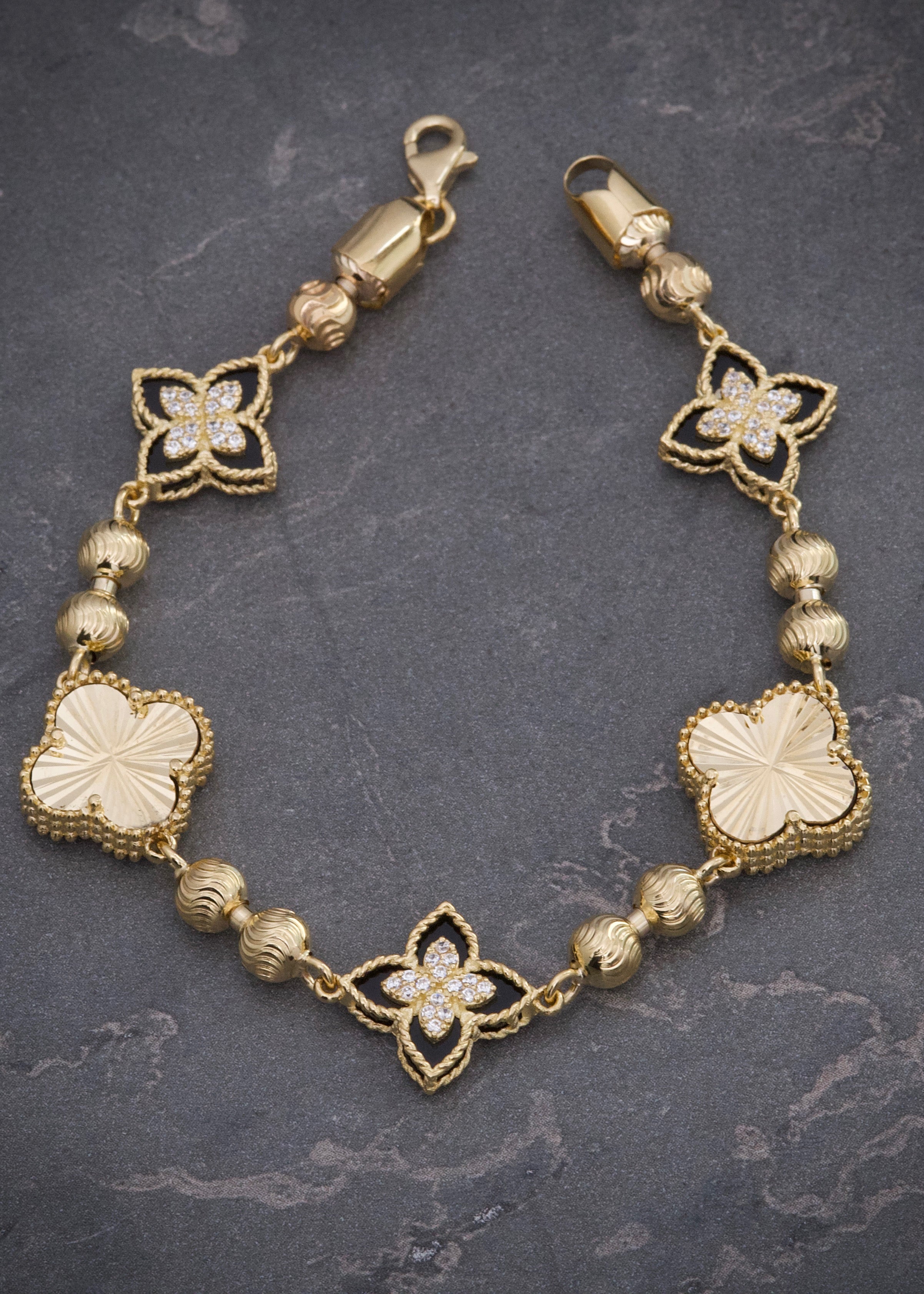 Pulso lucky clover piedra negra y diamantado 15.55gr / Largo 17.5cm / Oro Amarillo (Joya) M