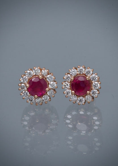 Topos con 143pts de rubies y 58pts de diamantes 4.6gr / Largo 0.9cm — Oro Rosado