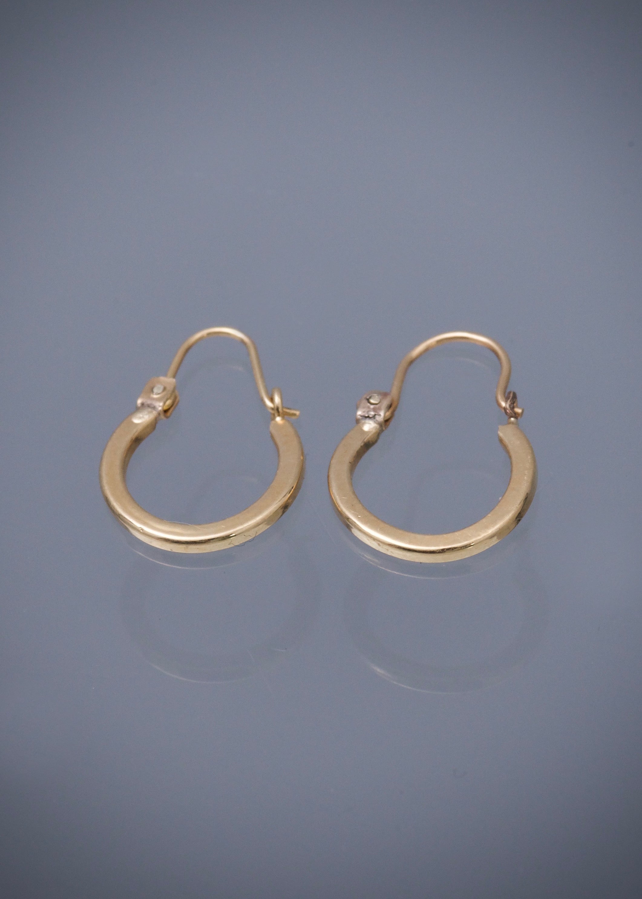 Candongas lisas 0.7gr / Largo 1.5cm / Oro Amarillo Nac B