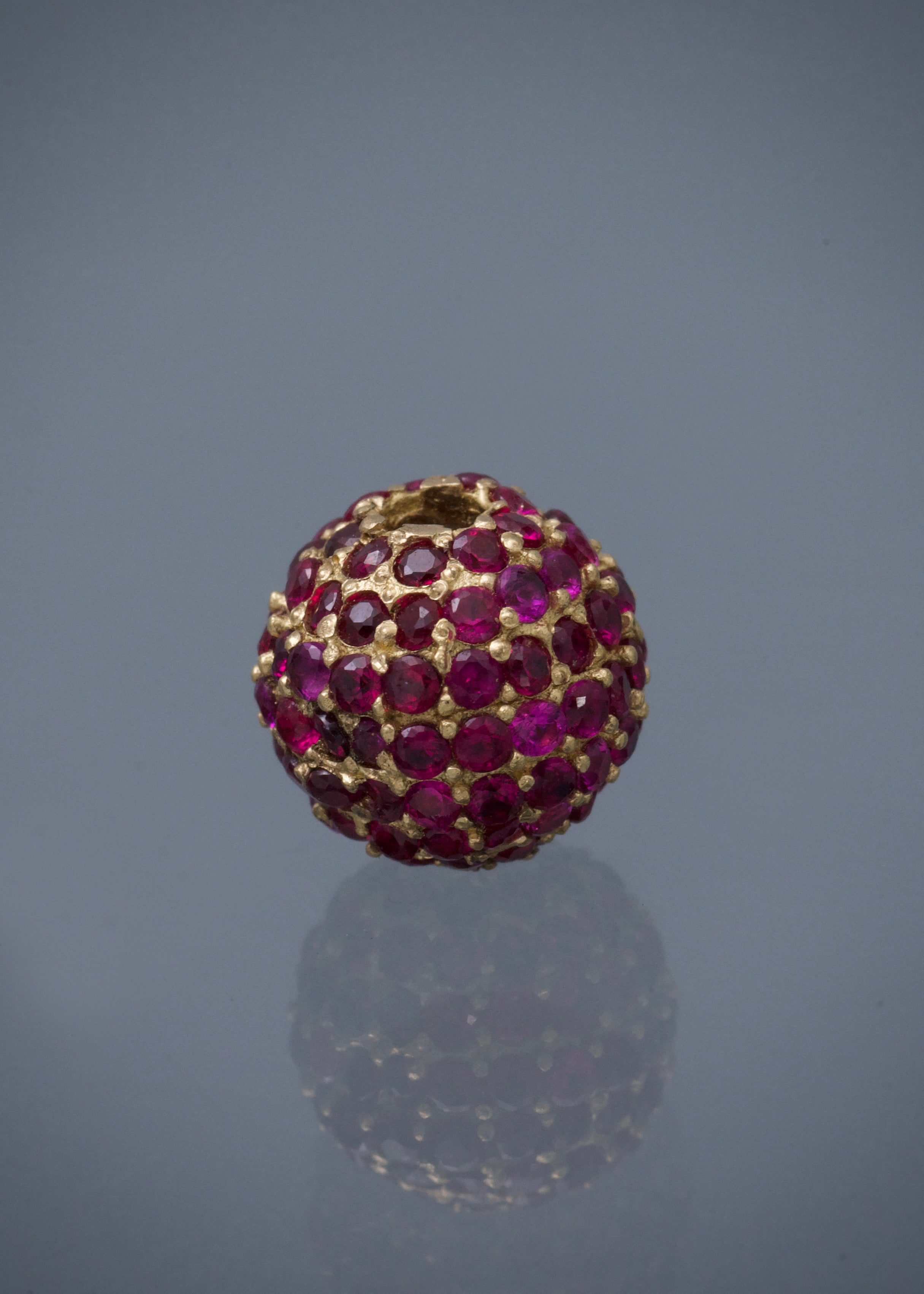 Herraje bola de fuego con swarovski fucsia 2.35gr / Oro Amarillo Nac B