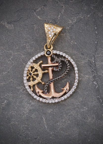 Dije ancla y timon con swarovski blanco 4.15gr / Largo 3.1cm / Dos Oros Nac P
