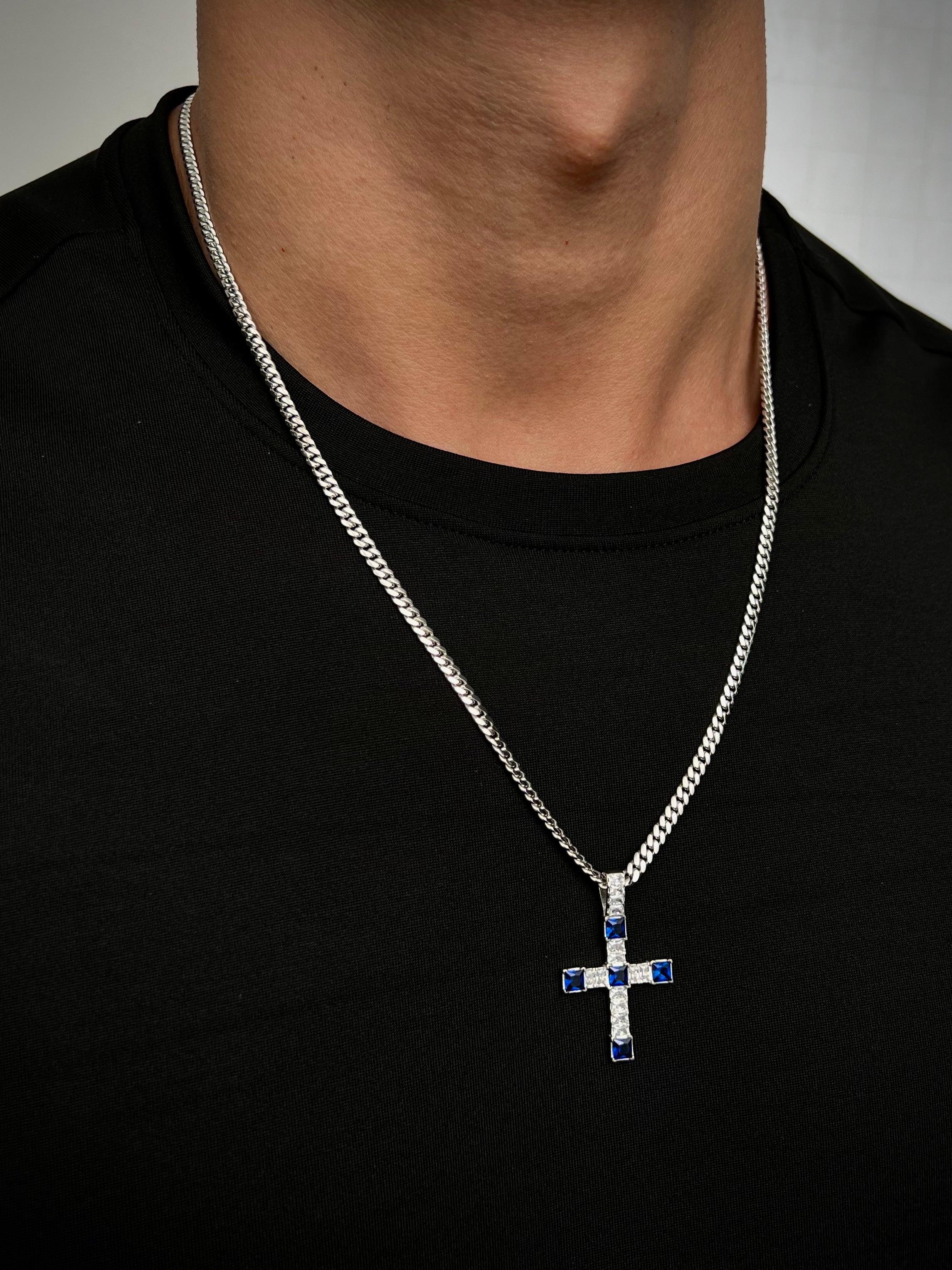 Dije cruz con swarovski blanco y azul 5.4gr / Largo 3.7cm / Oro Blanco Nac M