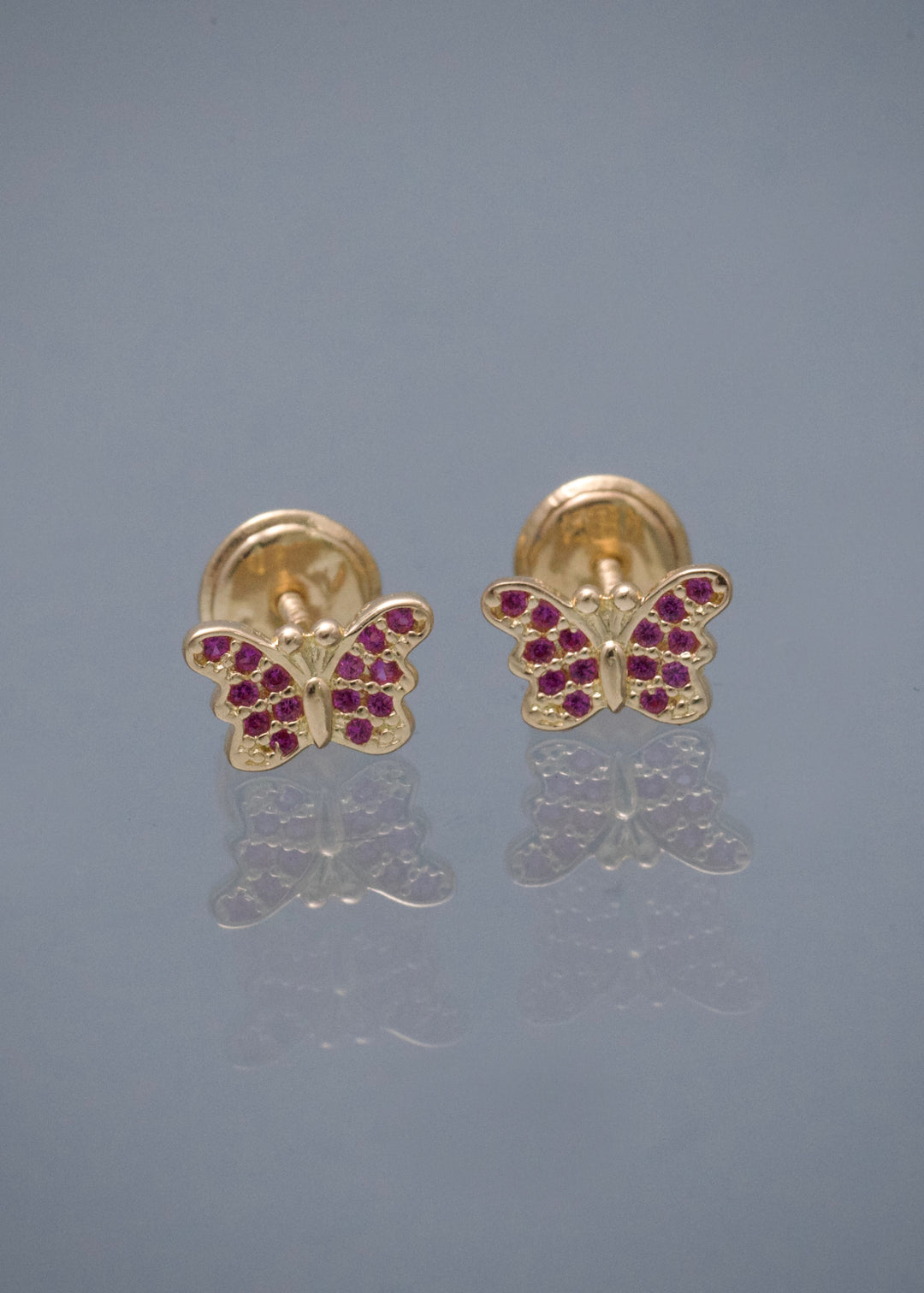 Topos Mariposa con Swarovski Fucsia 0.9gr / 0.5cm / 7.5mm — Oro Amarillo