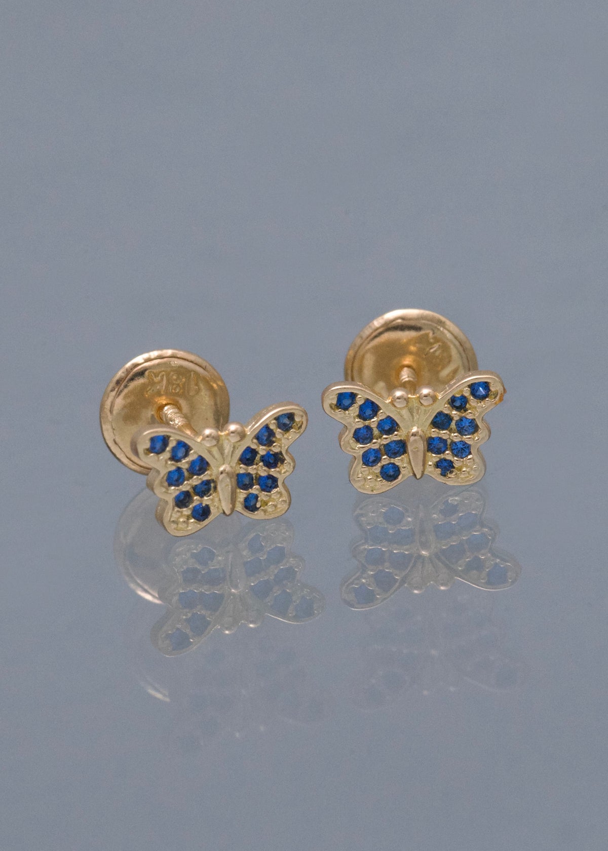 Topos Mariposa con Swarovski Azul 0.9gr / 0.5cm / 7.5mm — Oro Amarillo