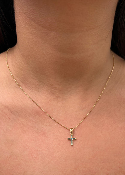 Dije cruz con 12pts de moissanita azul 0.5gr / Largo 1.6cm / Oro Amarillo (Joya) B