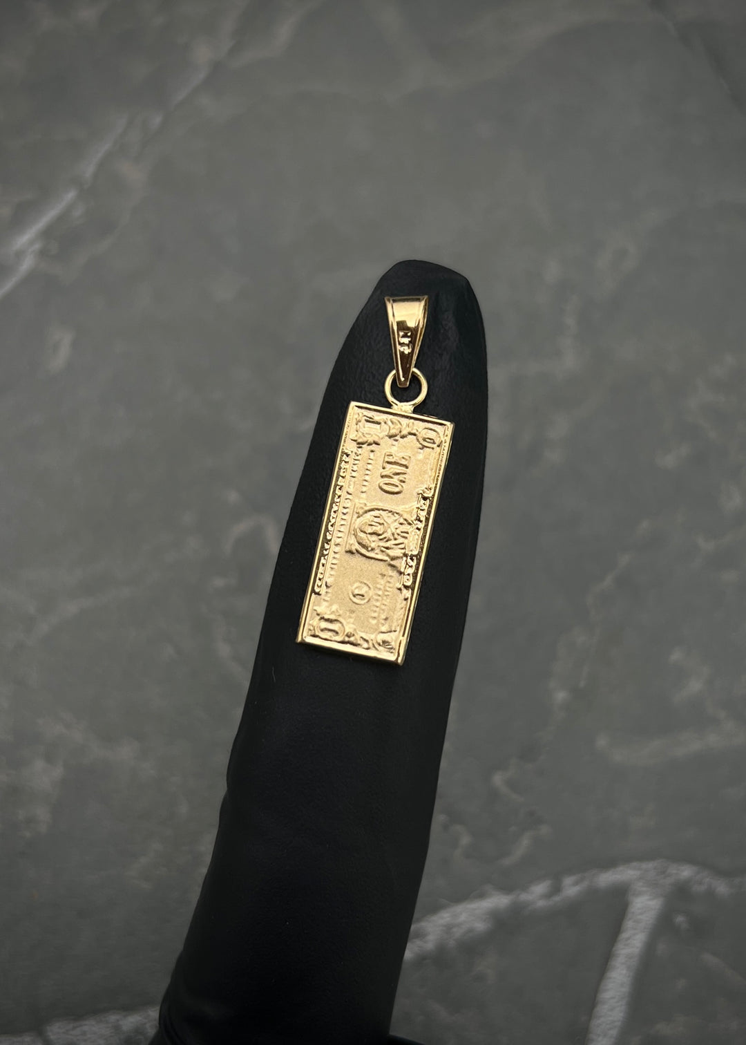 Dije dolar 1.4gr / Largo 2.9cm / Oro Amarillo Nac M