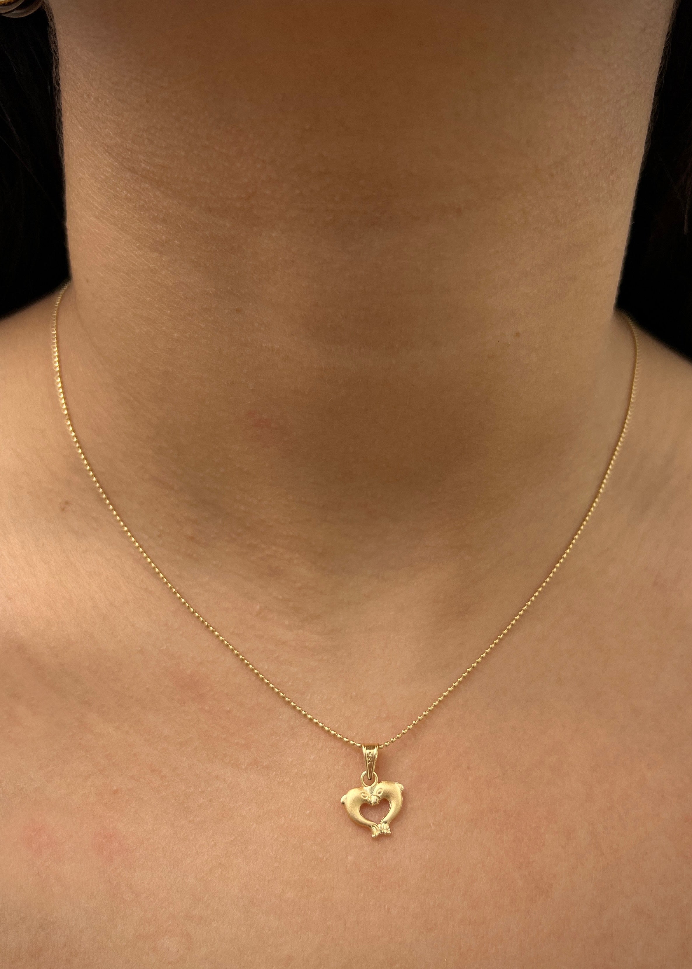 Dije de delfin 0.4gr / Largo 1.5cm / Oro Amarillo Nac P