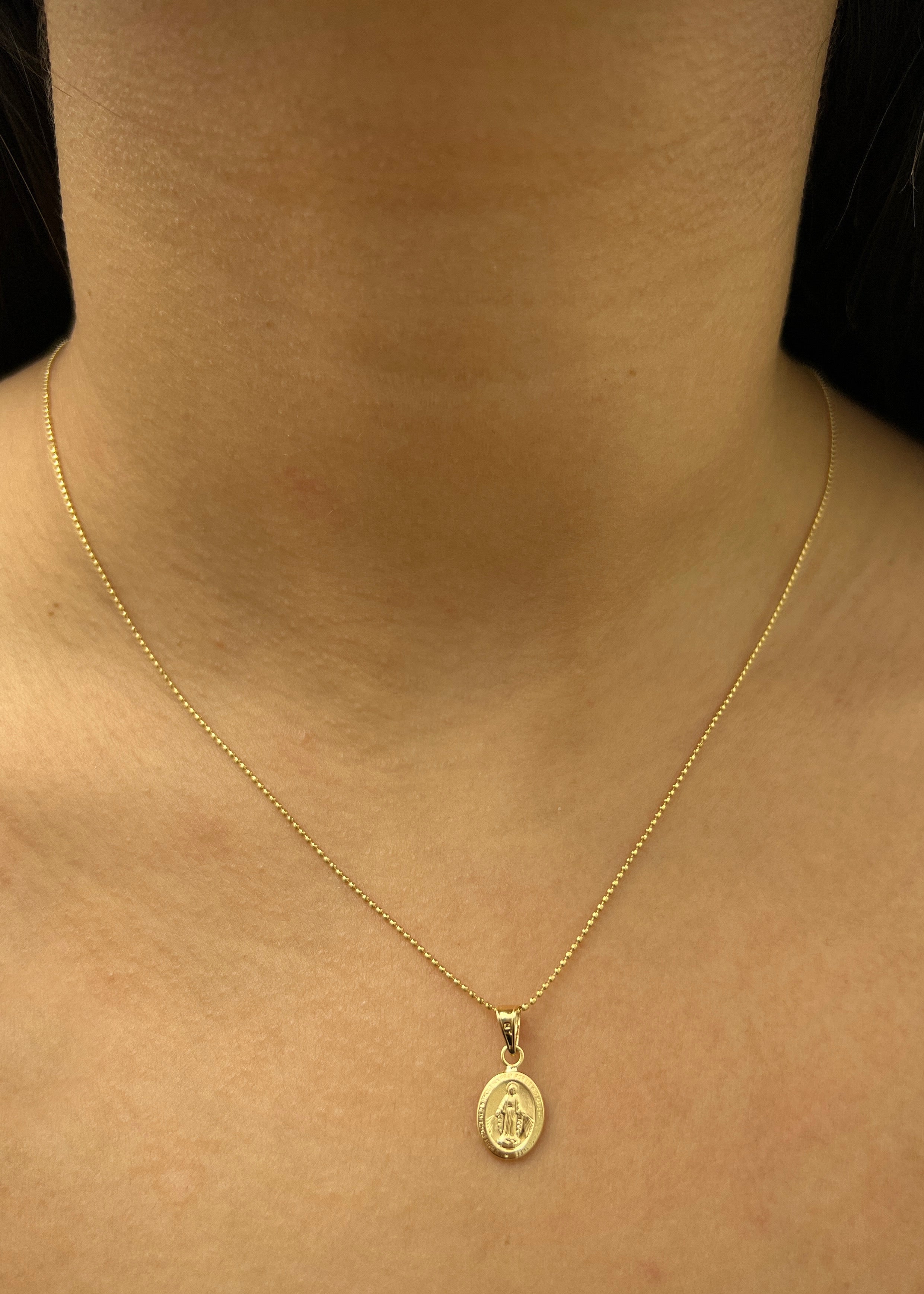 Dije virgen de la milagrosa 0.8gr / Largo 2.3cm / Oro Amarillo Nac P