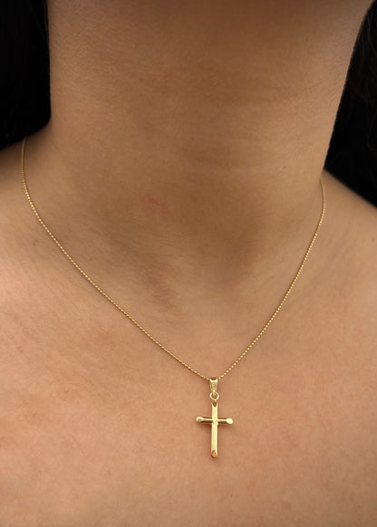 Dije de cruz lisa 0.5gr / Largo 2.5cm / Oro Amarillo Nac B