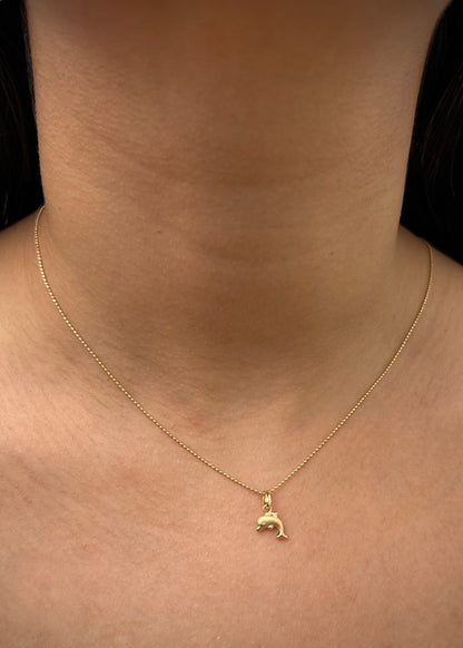 Dije de delfin 0.3gr / Largo 1.5cm / Oro Amarillo Nac M