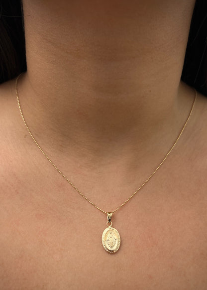 Dije Virgen De la Milagrosa 0.8gr / Largo 2.4cm / Oro Amarillo Nac M