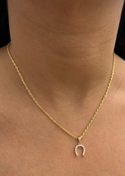 Dije Herradura de Caballo con Swarovski Blanco 0.9gr / 1.7cm / 9.5mm — Oro Amarillo
