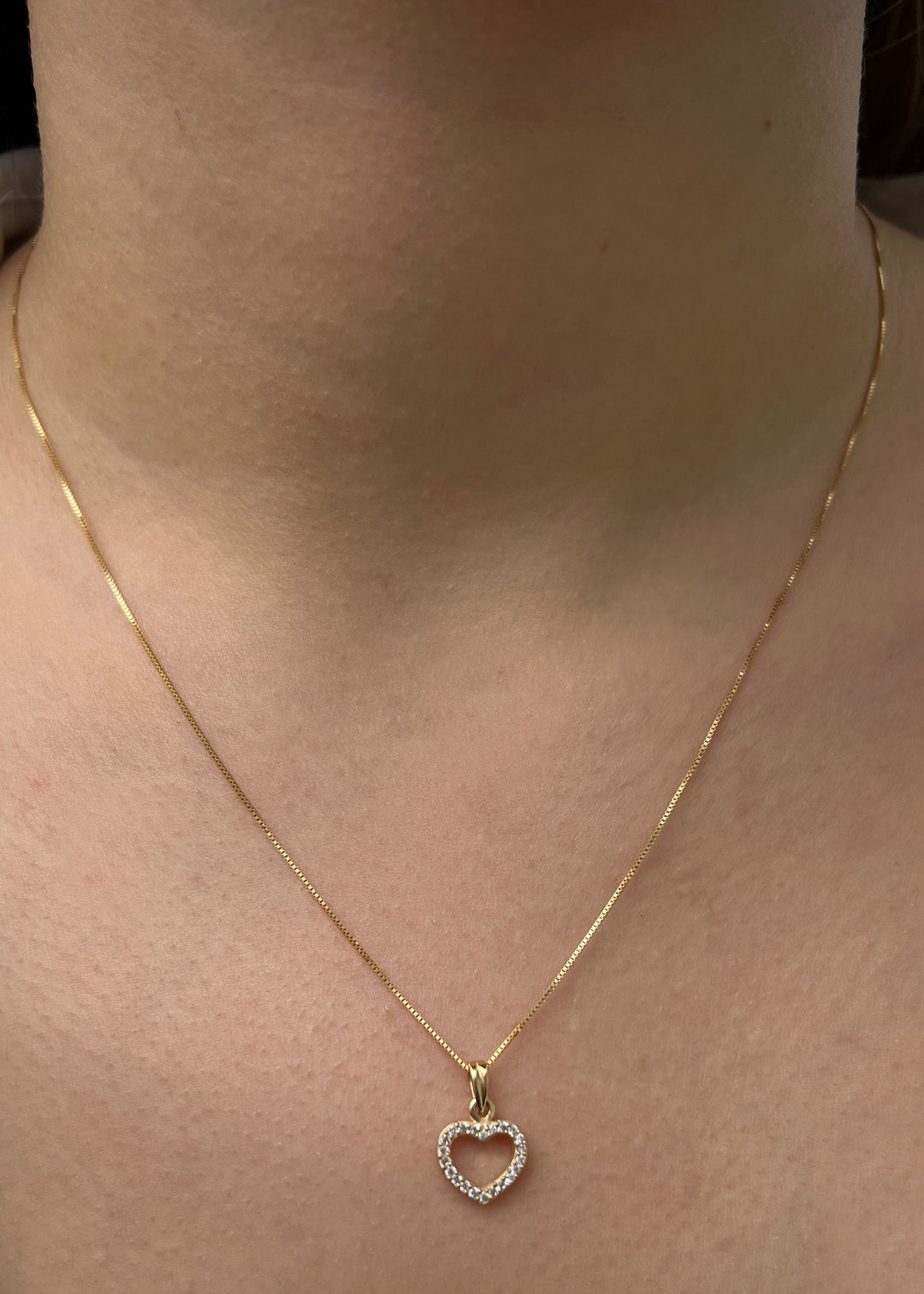 Dije corazon con swarovski blanco 0.95gr / Largo 1.5cm — Oro Amarillo