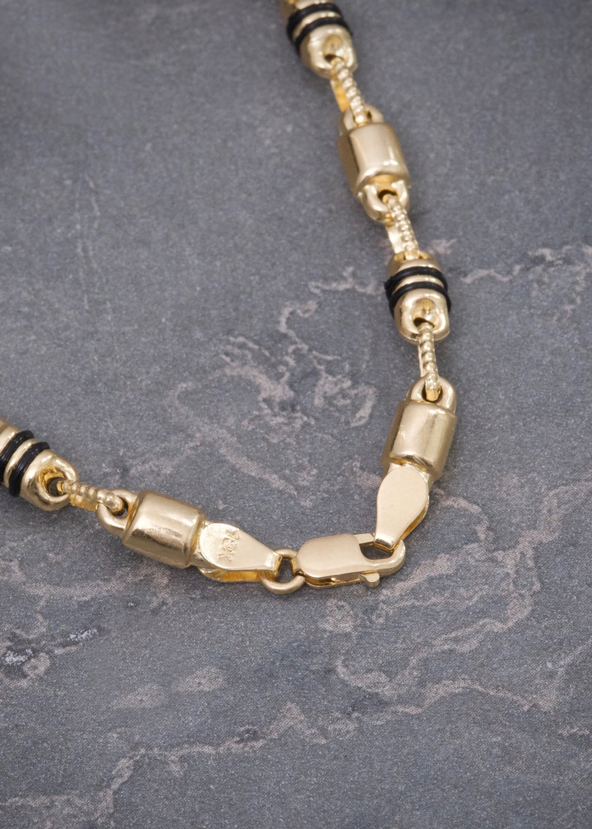 Cadena con Cauchos Negros 16.1gr / 60cm / 4.5mm — Oro Amarillo