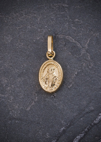 Dije Virgen de la milagrosa 0.3gr / Largo 1.5cm / Oro Amarillo Nac M