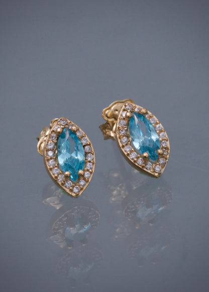 Topos con swarovski azul y blanco 1.8gr / Largo 1cm / Oro Amarillo Nac P