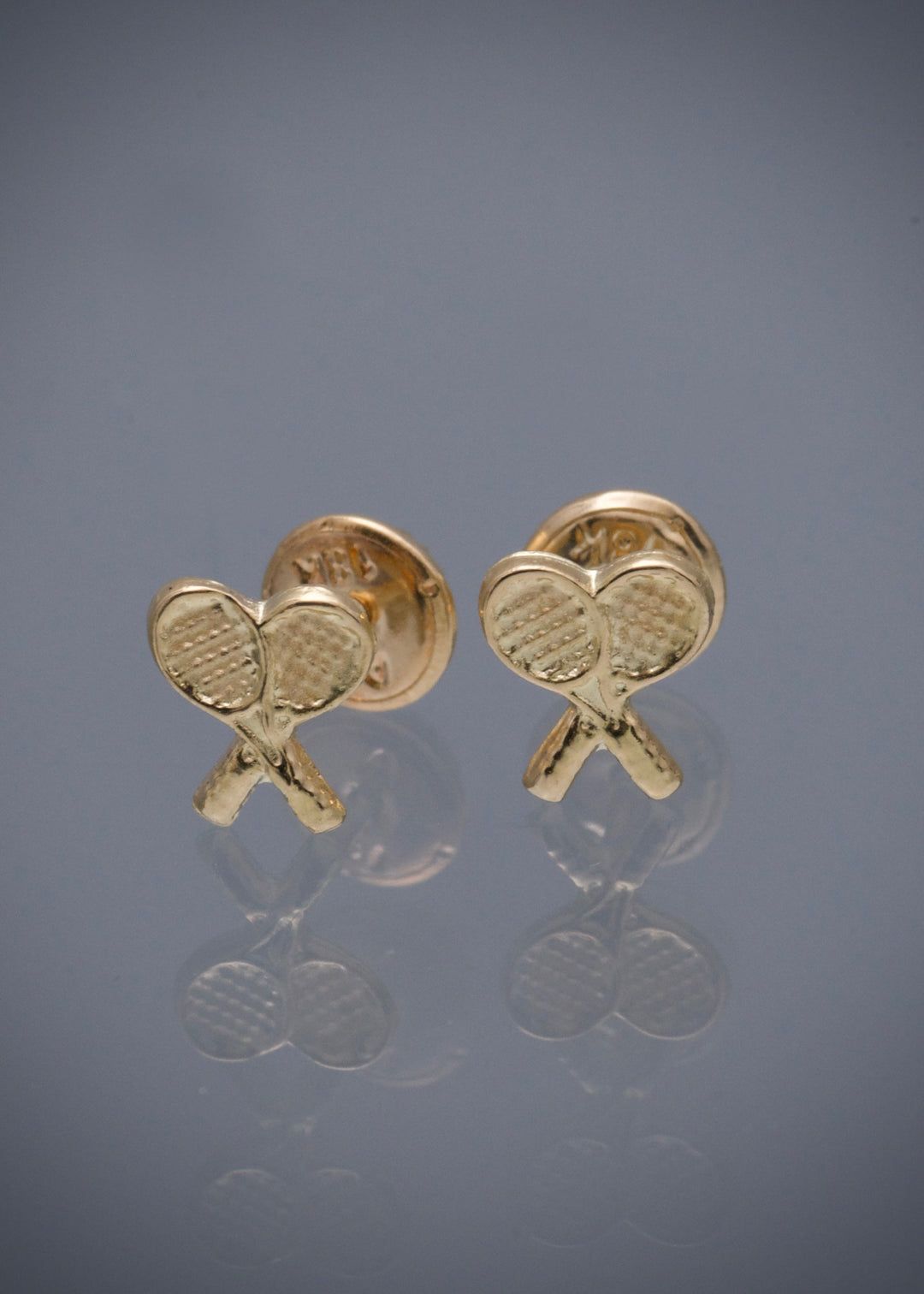 Topos de raqueta 0.6gr / Largo 0.3cm — Oro Amarillo