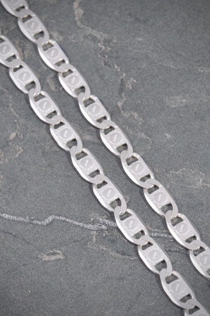 Cadena plana con grabado 21.1gr / Largo 60cm / Plata B