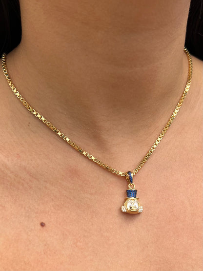 Dije tio rico con swarovski azul y blanco 5.05gr / Largo 2.5cm / Oro Amarillo Nac P