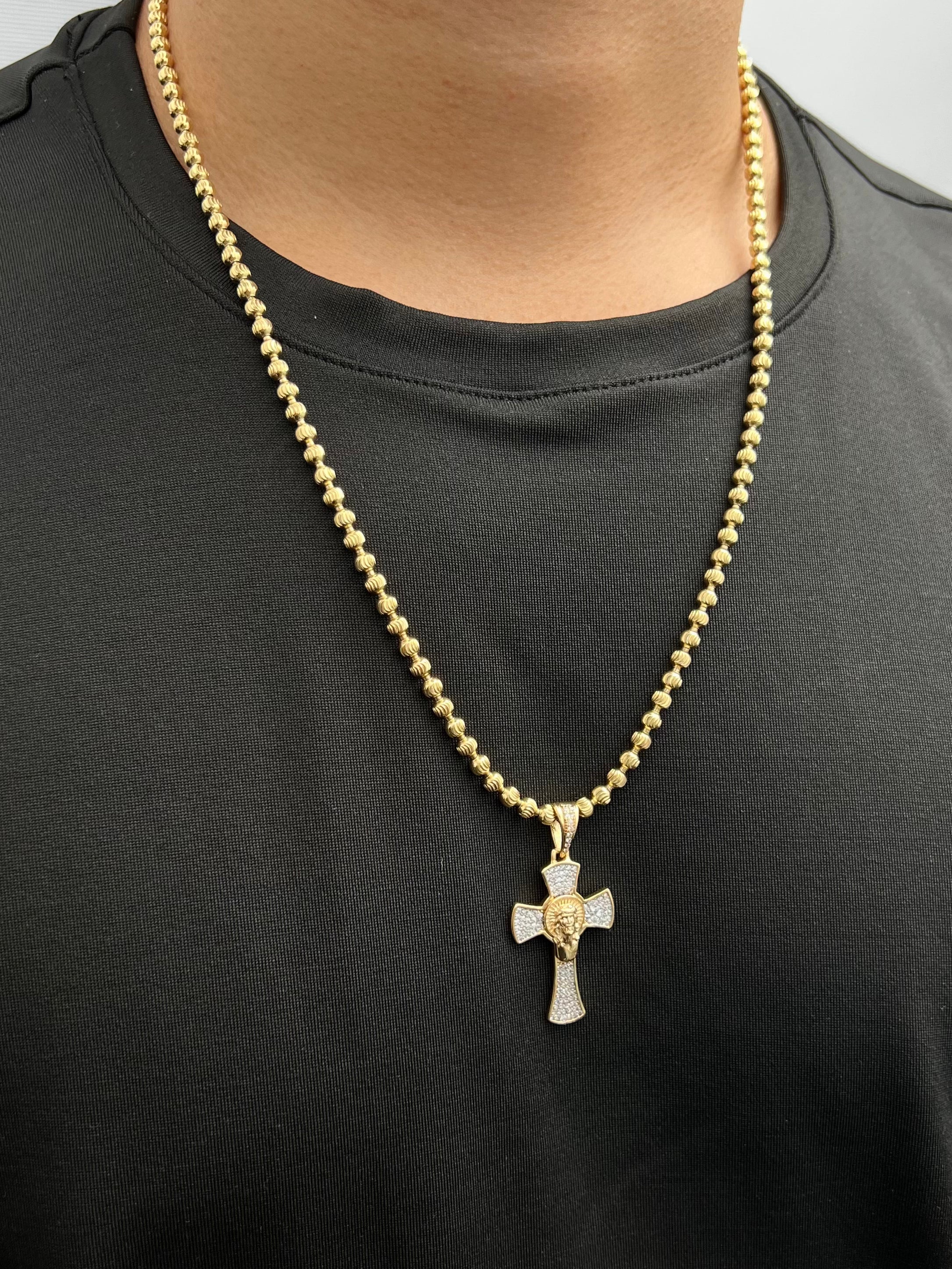 Dije cruz con cristo y swarovski blanco 5.35gr / Largo 4.3cm / Oro Amarillo Nac B