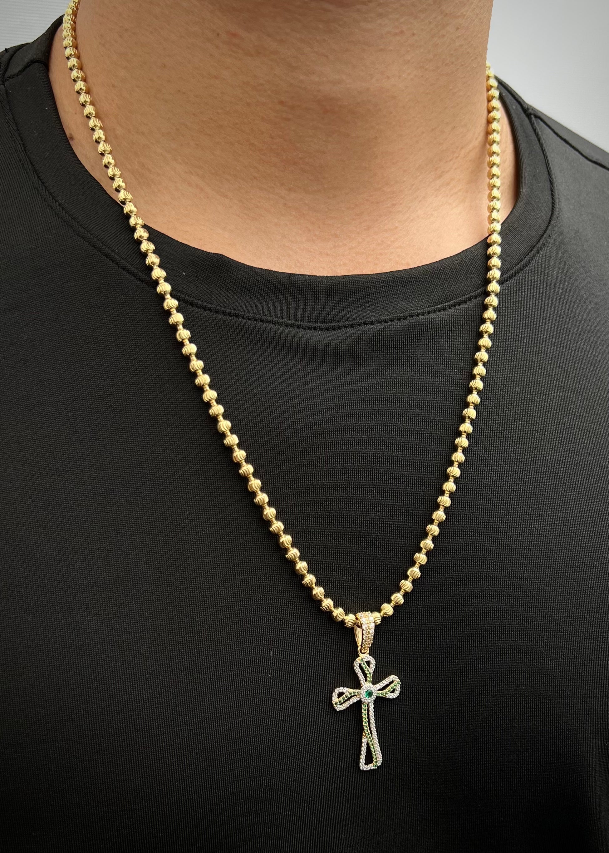 Dije cruz con swarovski verde y blanco 3.8gr / Largo 4.6cm / Oro Amarillo Nac B