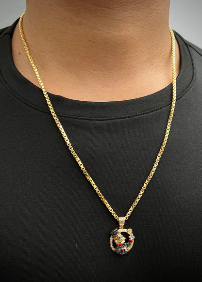 Dije tio rico con swarovski negro y blanco 4.7gr / Largo 2.8cm / Oro Amarillo Nac B