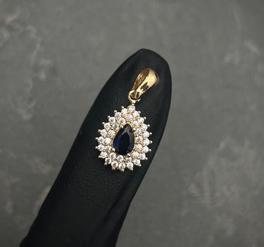 Dije lagrima con swarovski azul oscuro y blanco 1.8gr / Largo 2cm / Oro Amarillo Nac P