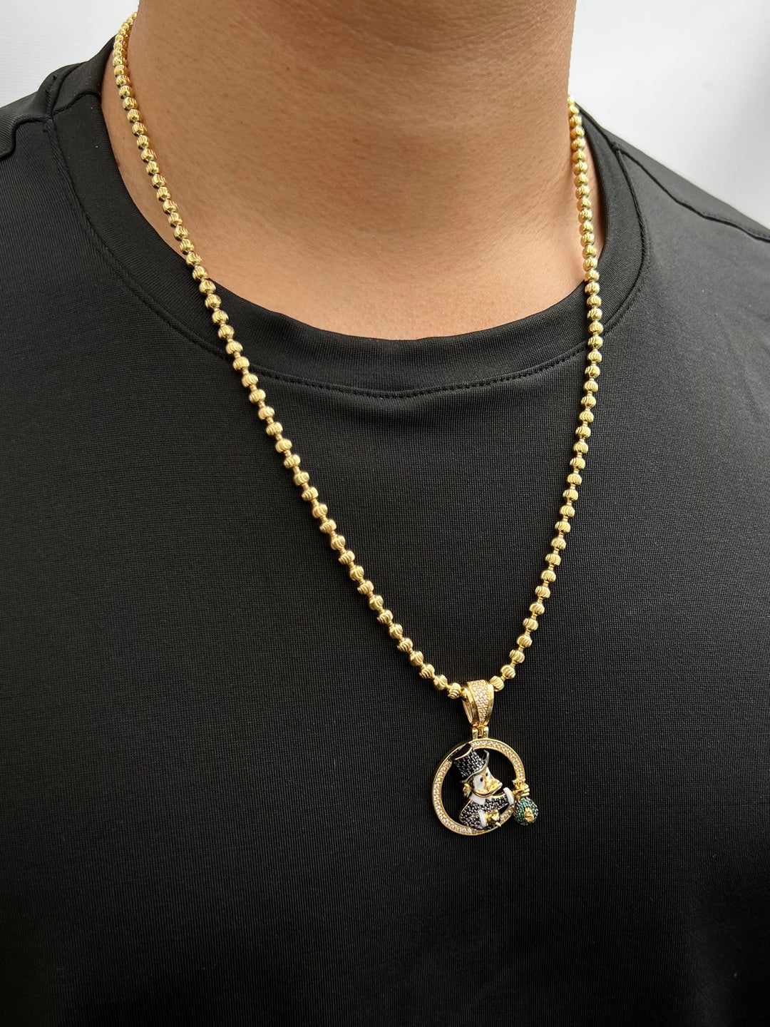 Dije tio rico con swarovski negro y blanco 9.6gr / Largo 3.9cm — Oro Amarillo