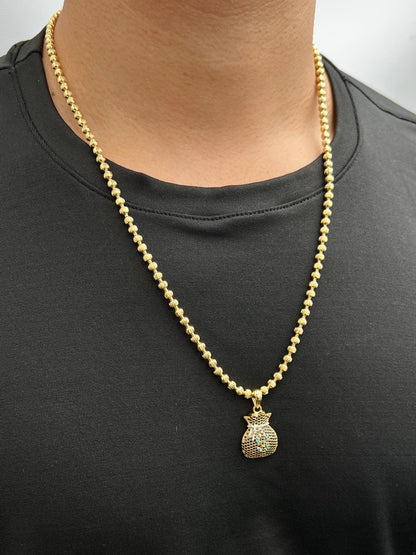 Dije bolsa de dinero con swarovski negro y verde 4.45gr / Largo 3cm / Oro Amarillo Nac P