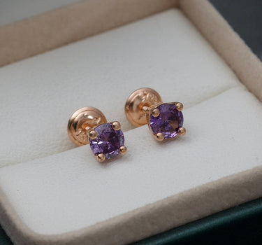 Topos con swarovski morado 1.5gr / Oro Rosado Nac M