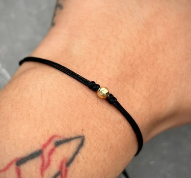 Pulsera en hilo negro con bola diamantada 4mm 0.15gr / Oro Amarillo (Joya) M